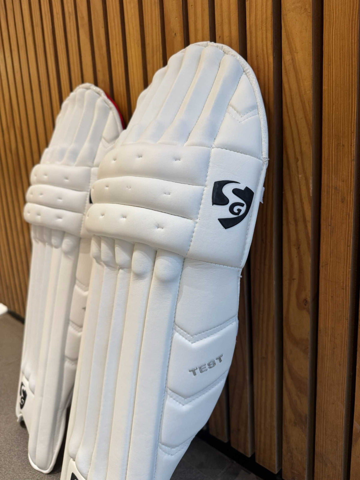 SG Test batting leg guard side-wing and knee protection detail