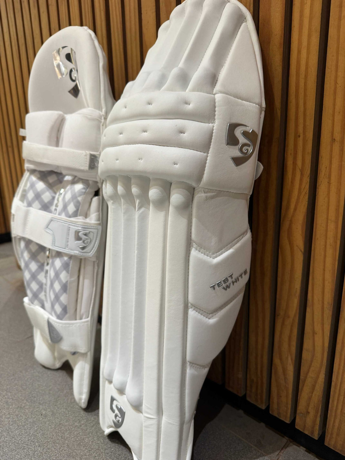 SG Test White batting leg guard side-wing and knee protection detail