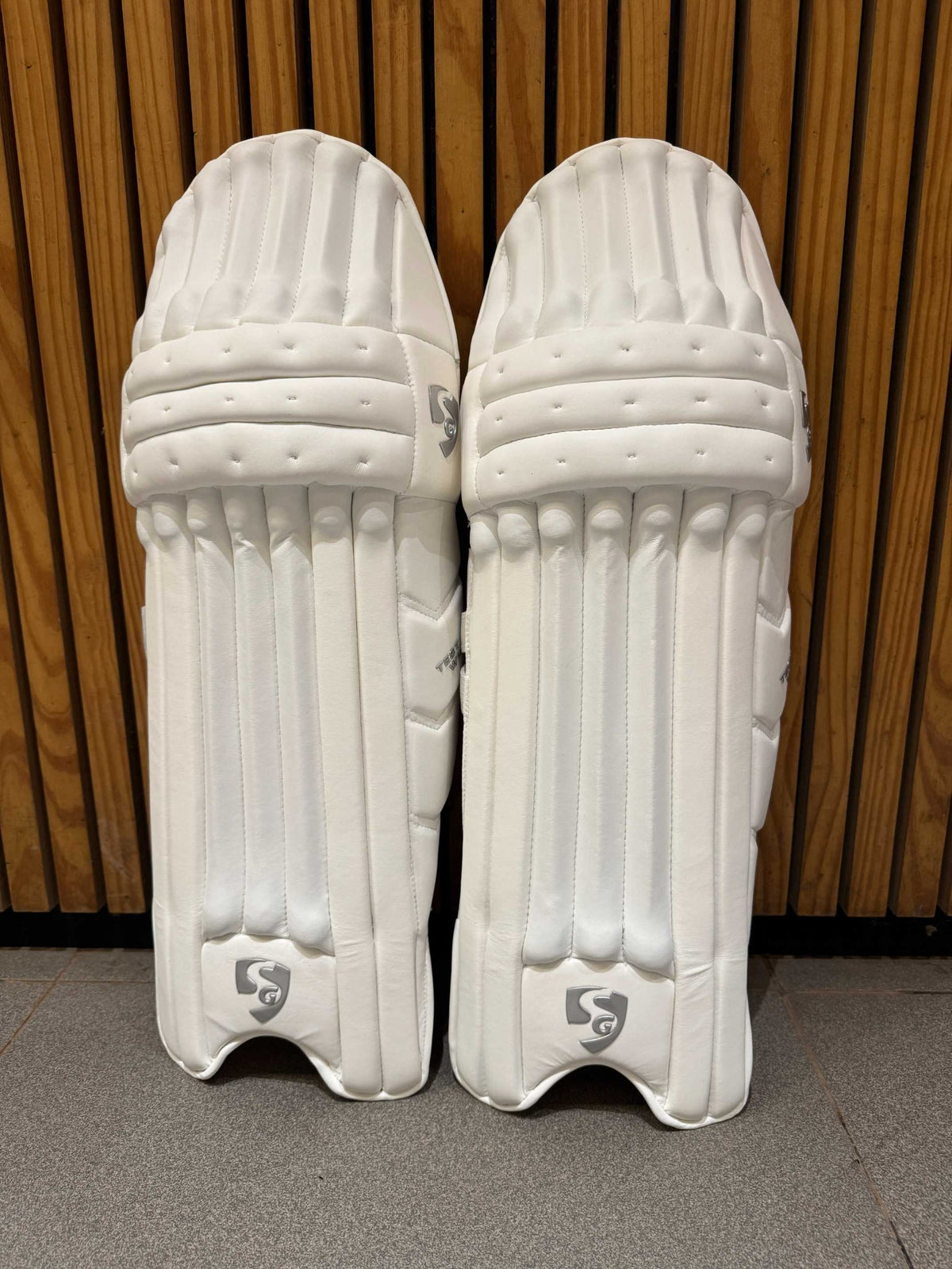 Pair of SG Test White men's right-hand batting leg guards