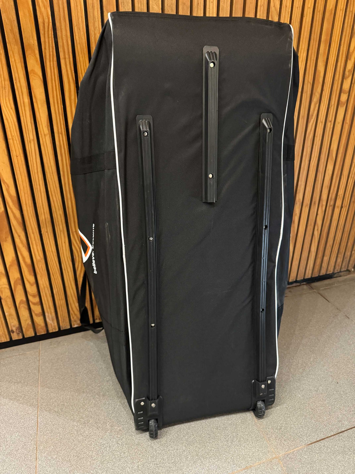 SG Blazepak Holdall Wheelie cricket kit bag wheel and compartment detail