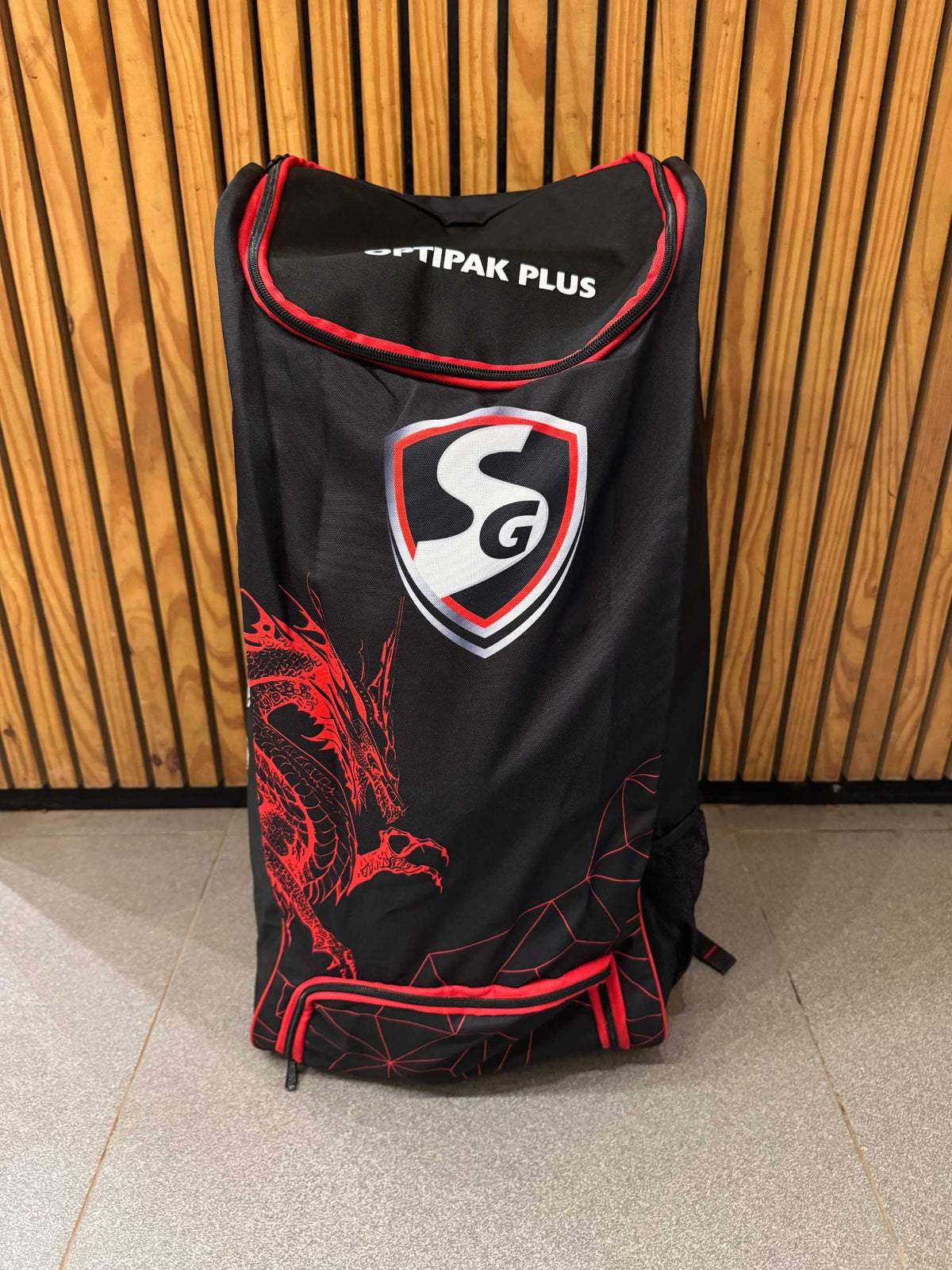 SG Dragon Optipak Plus Wheelie cricket kit bag wheel detail